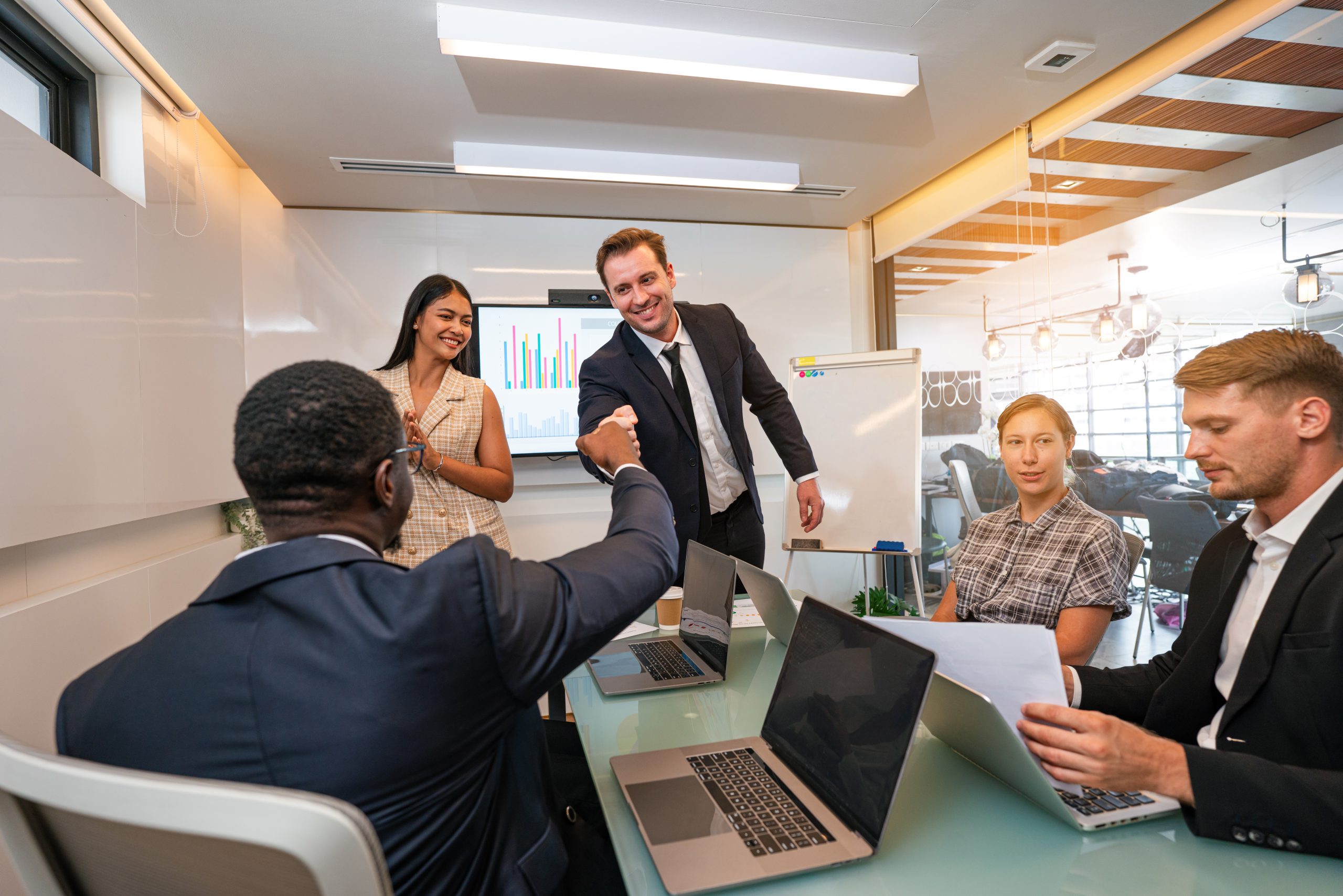 Multiracial business people having meeting and brainstorming discussed about work in conference room in the creative office.